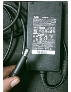 DELL LAPTOP CHARGER NEW AND ORIGINAL 180
