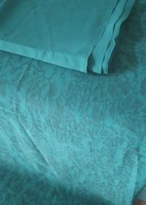 2 piece peacock green unstitched suit