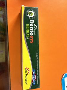 herbal toothpaste and brush free inside the box