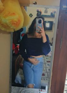 Top and Ripped Knee Jeans