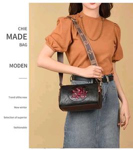 Embossed Floral Leather Crossbody Bag