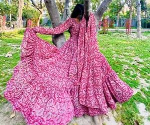 RED PRINTED FLARED KURTA SET WITH DUPATTA