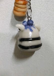 Cute zebra striped pug and pancake keychain