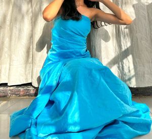 A Tube Party Wear Princess Gown With Heavy Flounce