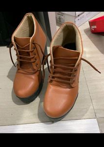A Pair Of Beautiful Casual Tan Boot For Ladies.