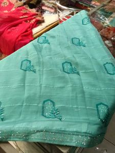 Elegant Teal Embroidered Pyar Wear Saree