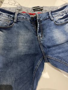 Mid Rise Blue Denim Jeans