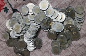 20 Rupees Coins 100 Pcs + 10 RupeesCoins 100pcs.