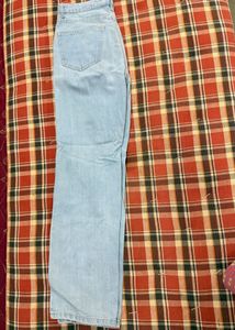 Ripped Light Wash Denim Jeans