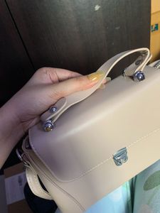 Nude Sling Bag With Silver