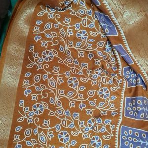 Brown Floral Maheswari Semi Silk Saree .