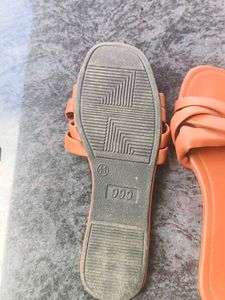 Black And Orange Flipflops