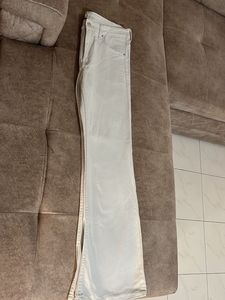 Cream bootcut Jeans
