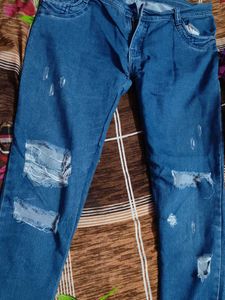 Ripped Blue Denim Jeans