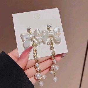 Bow &amp; Pearl Dangle Earrings