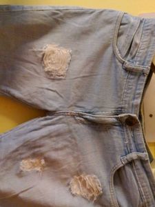 Short Ankle Length Ripped Jeans For Women