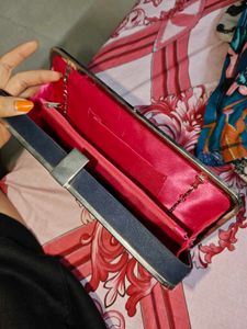 Pink Clutch suede sling