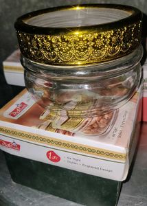 Beautiful New Glass Jar With Golden Glitter Lit.