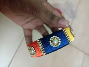 2 Sets Of Multi Colour Thread Bangles
