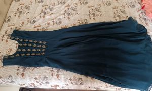 Beautiful Dark Green Sleeveless Gown For Party