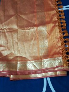 It Is Beautiful Mango Color Silk Saree.