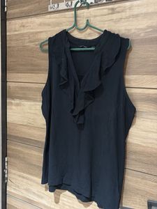 Elegant Ruffled Sleeveless Top