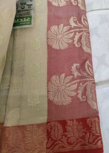 Elegant Beige Saree with Floral Border