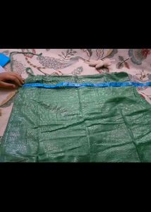 Heavy Party Wear With Stone Work Green Net Saree