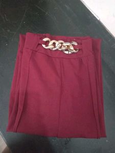 Maroon Wide-Leg Pants with Gold Chain Accent