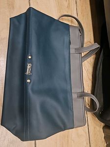 Enoki Brand New 4 Zipper Bag Never Used