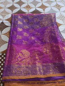Elegant Purple zari and  stone work saree