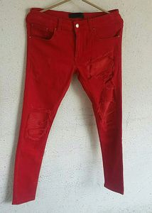 AMIRI Red Cotton Stretch MX1 Leather Patch Jeans From AMIRI.