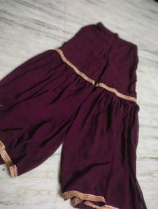 A Beautiful Women Festive Wear Wine Sharara