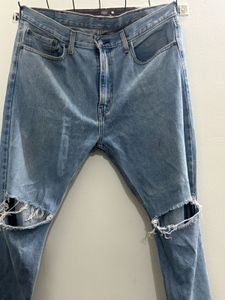 Ripped Knee Jeans