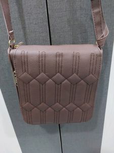 BRAND NEW SLING BAG.