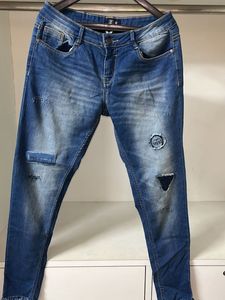 Ripped Jean With Designs For Women