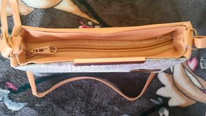 golden colour sling bag