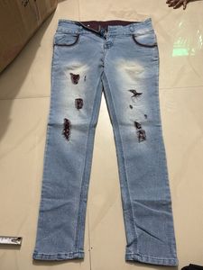 Ripped Light Wash Jeans