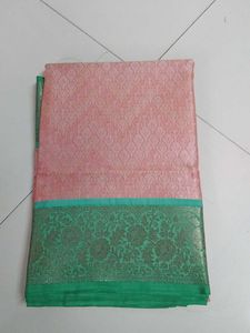 Elegant light orange & Green Saree