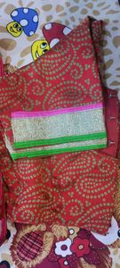 Bright red Gujarati leheriyu saree with pink and green border lace with blouse