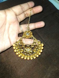 Heavy Earrings And Magtika