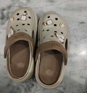 Beige Crocs with Charms