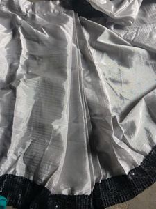 Elegant Silver Saree with Black Border