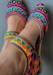 Jaipuri juttis or Rajasthani mojaris.