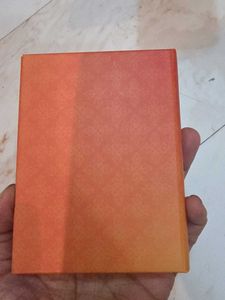 orange silver coin empty box