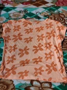 bust size 30 ... orange colour... floral flower print....