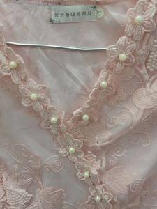 Girls Frock In Embroidered Net With White Beads.