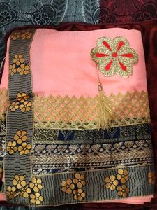 Elegant Peach Saree with Floral Border