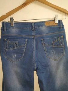 Distressed Denim Jeans