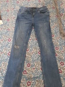 Distressed Bootcut Jeans